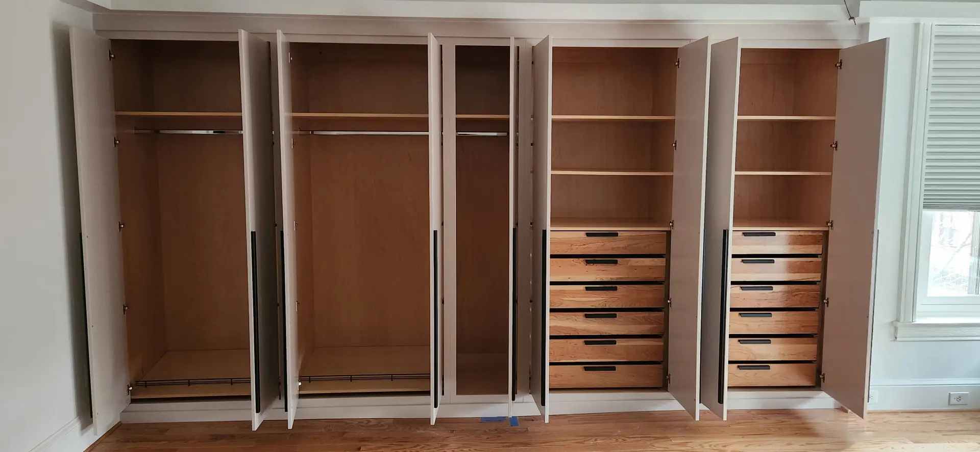 Hallway closet with storage